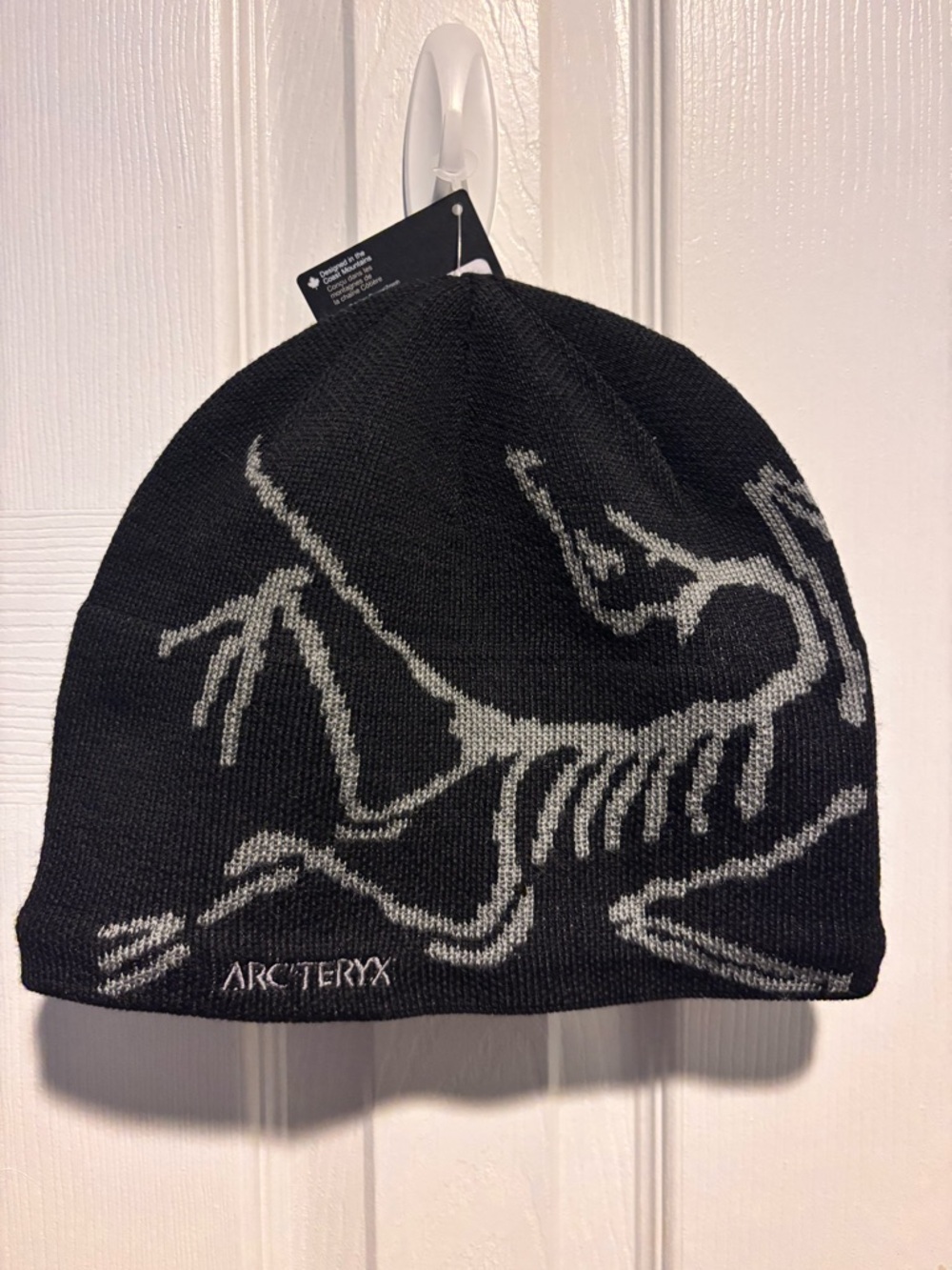 Arc'teryx Black Beanie with Grey Bird Head Pattern